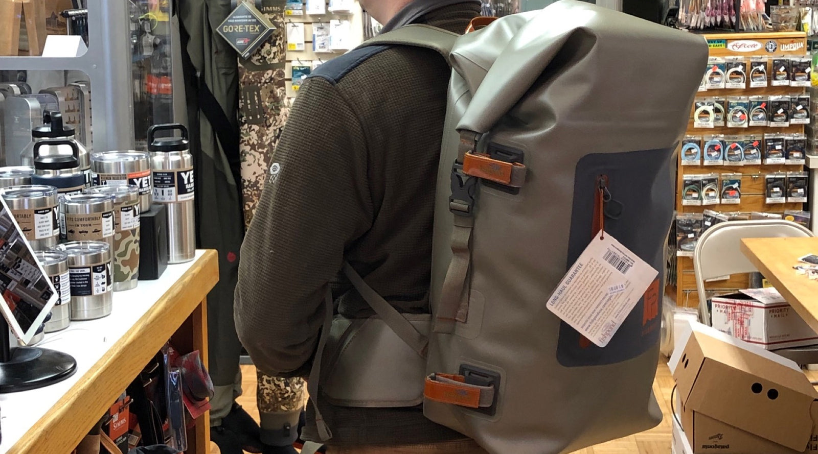 https://www.compleatangleronline.com/cdn/shop/articles/Gear_Review-_The_Fishpond_Wind_River_Roll-Top_Backpack_1600x.jpg?v=1551313951